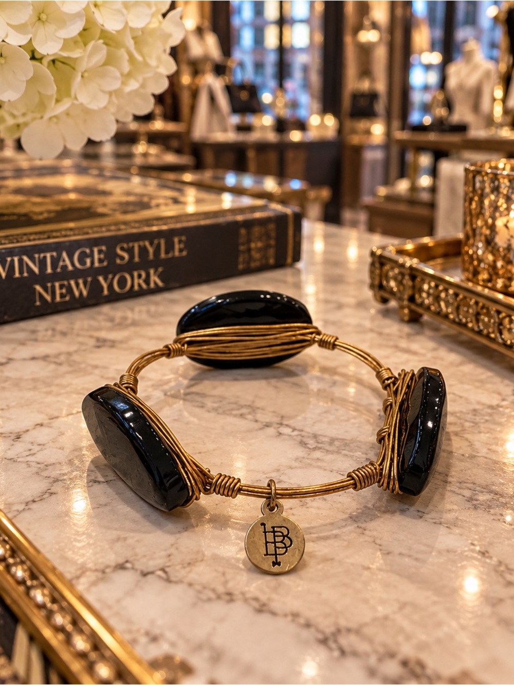 Bourbon and Bowties Gold Wire Bracelet with Black Stones